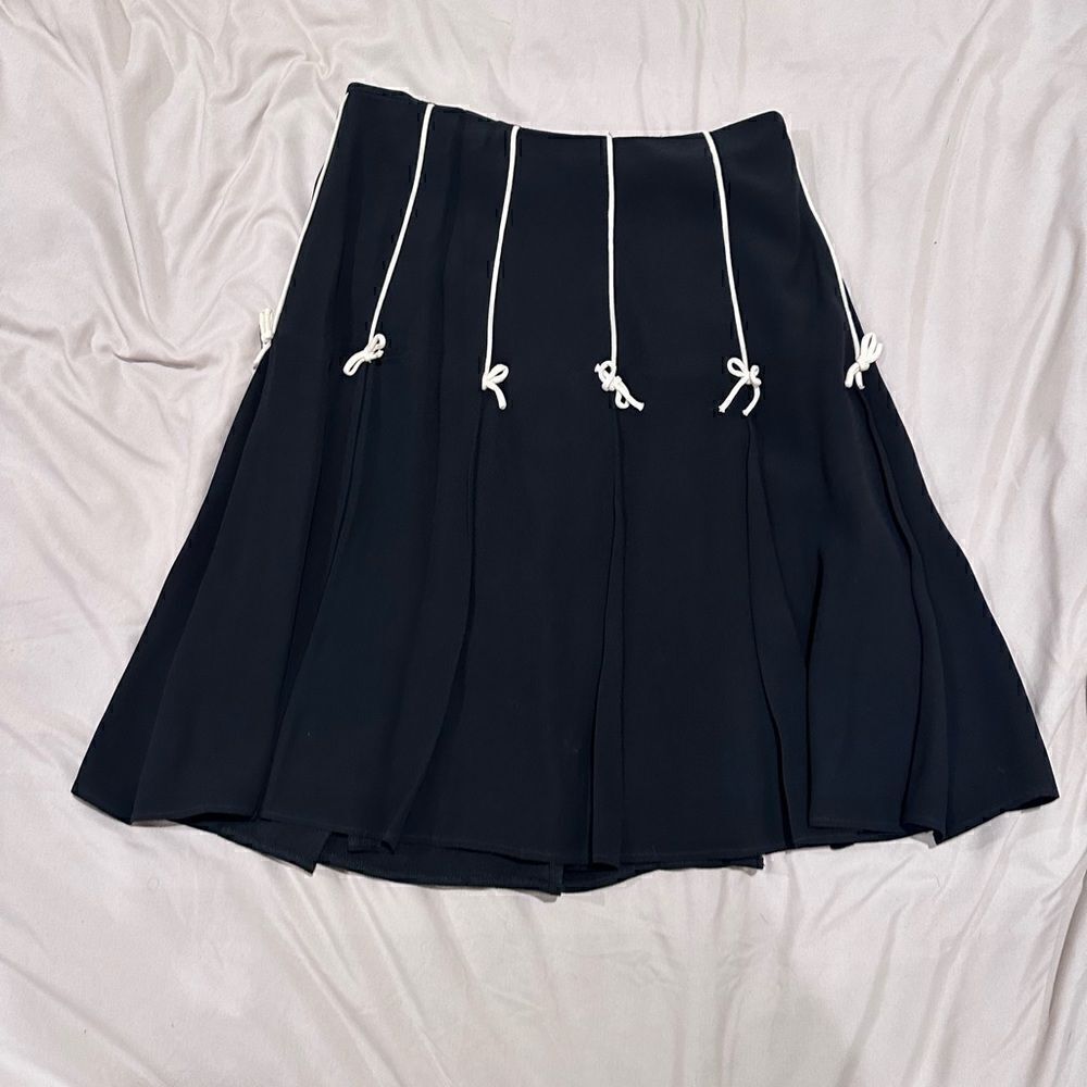 Black skirt with cream bows rouge a levres made in Italy size 42